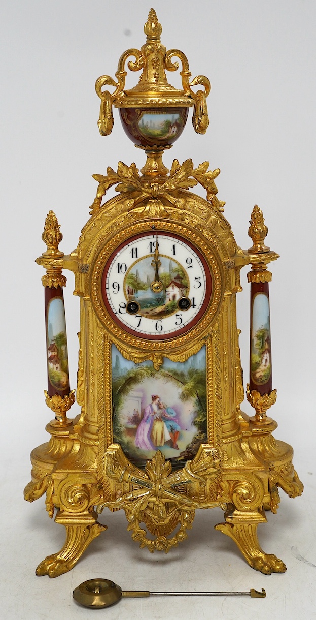 A 19th century French gilt spelter and porcelain mantel clock with pendulum, no key, 42cm. Condition - good, not tested as working